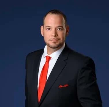 Barrett Henry, licensed Florida Broker Associate and REALTOR with REMAX Collective